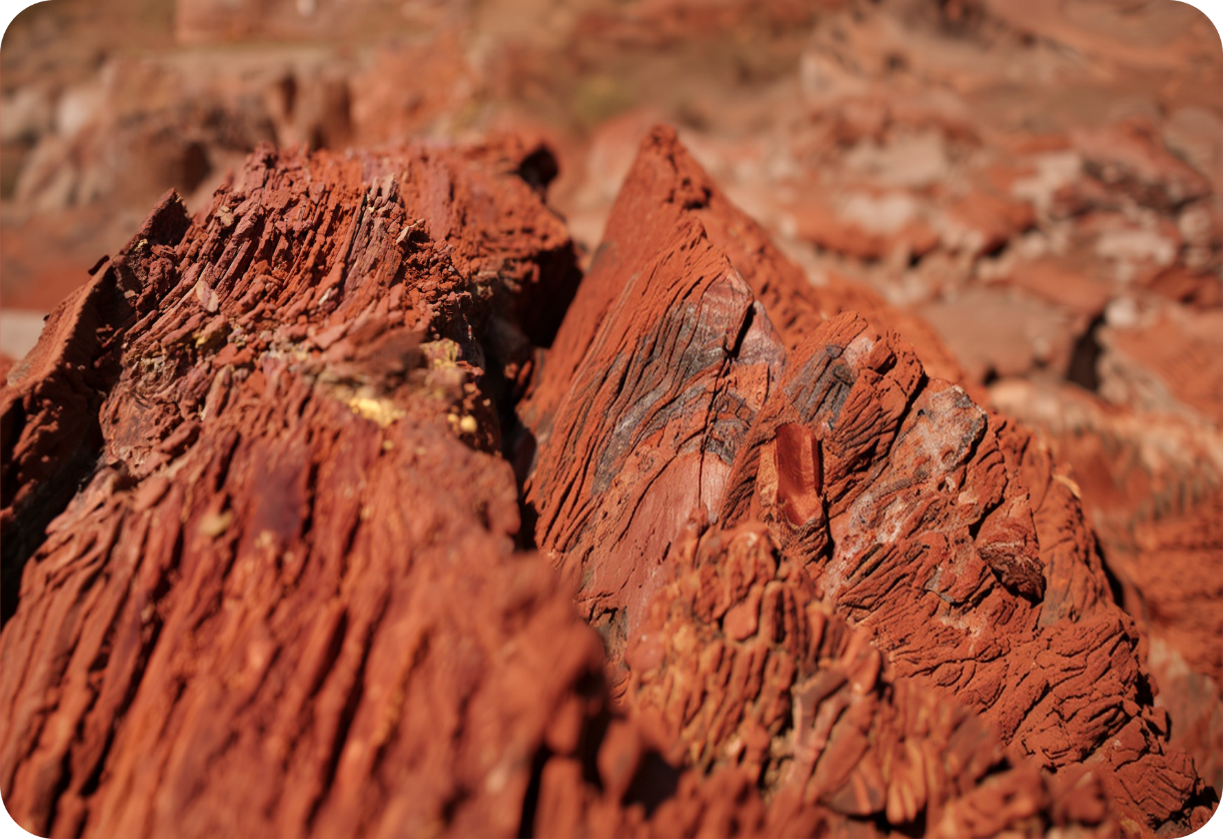 Close-up view of layered terracotta stone textures.